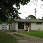 Front of home with detached garage