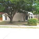 Soft contemporary styling with large trees.