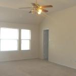 Master bedroom has dual walk-in closets and plenty of space for