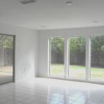FAmily room is open to kitchen/breakfast with large window to si